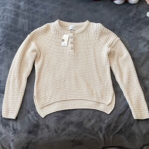 Beige sweater with tags